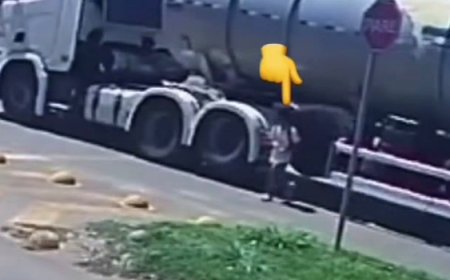 Criança atravessa debaixo de carreta parada em rotatória em Goianésia