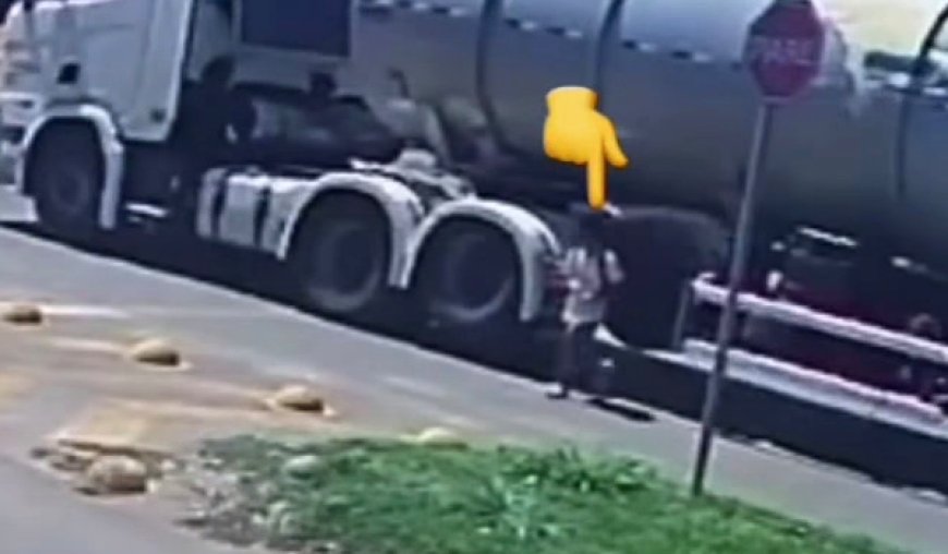 Criança atravessa debaixo de carreta parada em rotatória em Goianésia