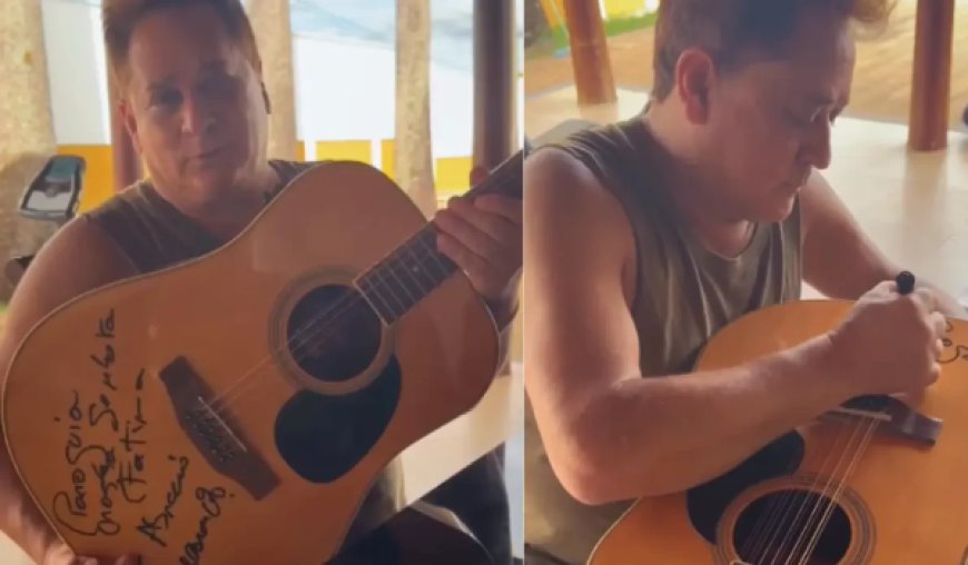 Vídeo mostra Leonardo autografando violão que será leiloado nesta quarta em festa de igreja de Goianésia