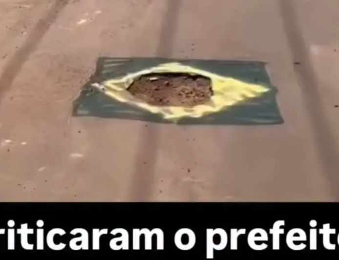 Em clima de Copa do Mundo, moradores pintam buracos nas ruas com cores do Brasil; vídeo